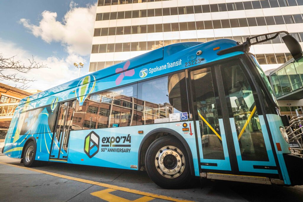 STA bus with design to commemorate the 50th anniversary of expo 74 .