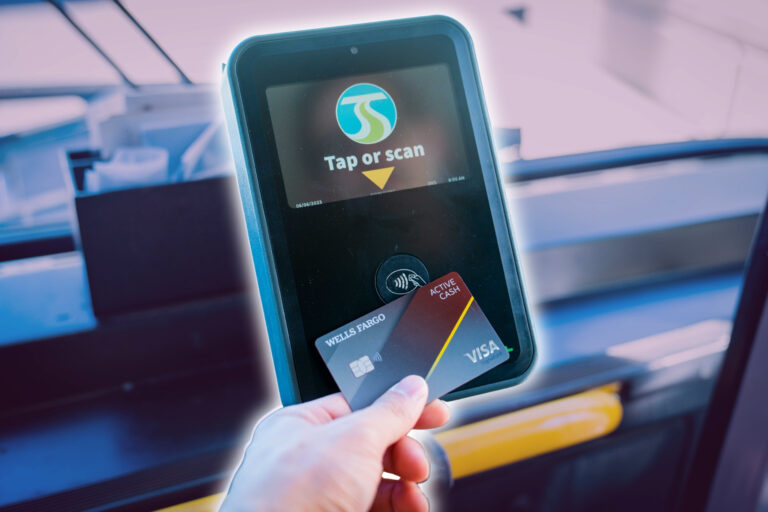 An image of a debit card being tapped at the fare box to pay for the ride.