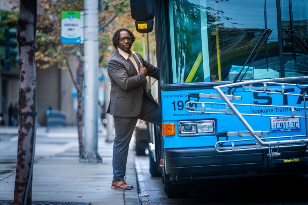 man boarding an STA bus