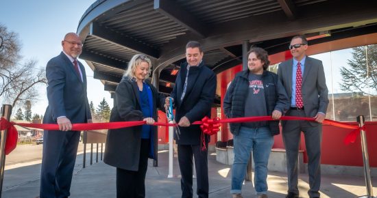 STA E. Susan Meyer, EWU President Dr. David May, Cheney Mayor Chris Grover, Representative Marcus Riccelli, and EWU Student Body Vice President Remington Steelman cut a ceremonial ribbon to celebrate the completion of Eagle Station at EWU.