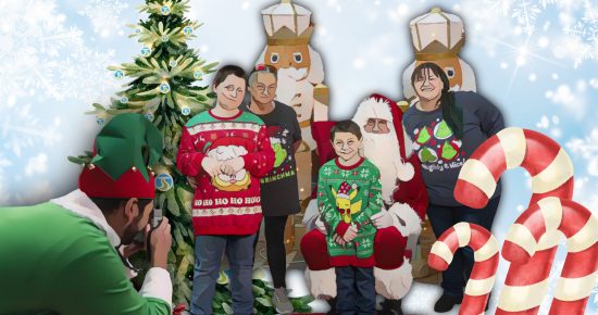 Family in Christmas sweaters poses with Santa inside STA Plaza by a tree as an elf takes their photo.